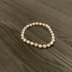 clear and gold bracelet